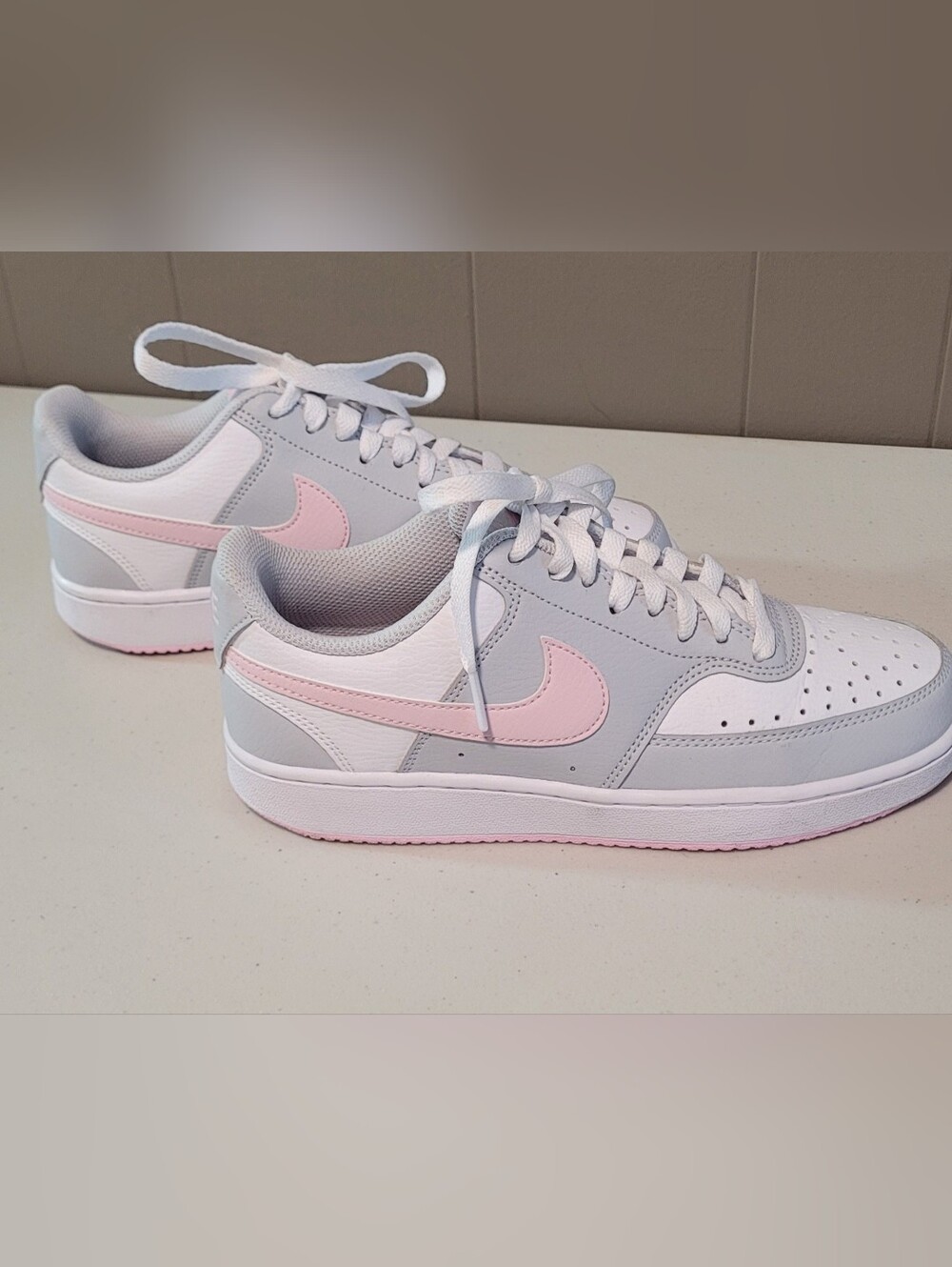 Nike Court Vision Womens Low sneakers in a grey and pink foam colorway Size 7.5